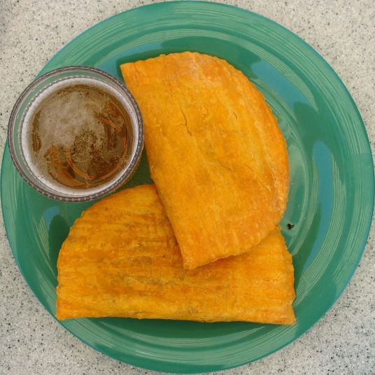 1200px-Jamaican_patties_and_redstripe